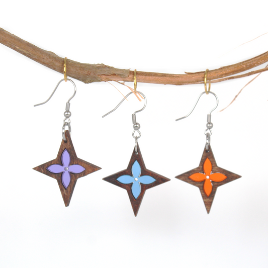 Star-shaped acrylic earrings, nature-inspired sustainable jewelry, available in purple, blue, orange